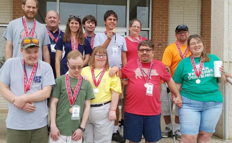 A large contingent of White County athletes participated in the Special Olympics Georgia State Masters Bowling Tournament. last weekend in Warner Robins. White County had 12 athletes competing in singles competition, which included more than 1,000 athletes from around the state. The White County group brought home nine gold medals, two silver medals and a bronze medal. The local athletes competing in the event were, front from left, Charlie Head, Trey Ward, Mary Goodman, Brian Head, and Brittany Freeman; ba
