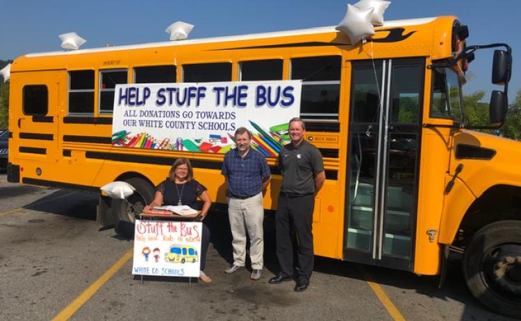 White County School System bus driver, Jack Haas, alongside the transportation department, organized a “Help Stuff the Bus” school supply drive. If you would like to donate, please stop by the bus in the Wal-Mart parking lot between now and Monday, Aug. 5. Pictured are superintendent Dr. Laurie Burkett, transportation director Darren Sledge, and assistant superintendent Scott Justus.