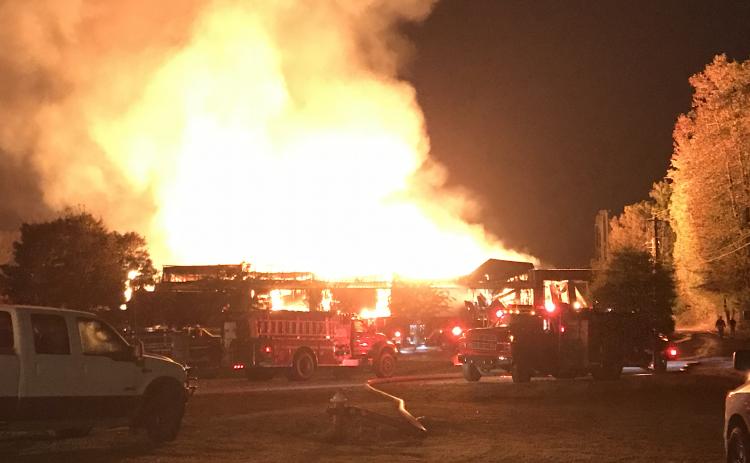 Authorities are looking into the cause of the early morning fire at North Georgia Hardwoods on Thursday, Oct. 22. (Photo/Stephanie Hill)