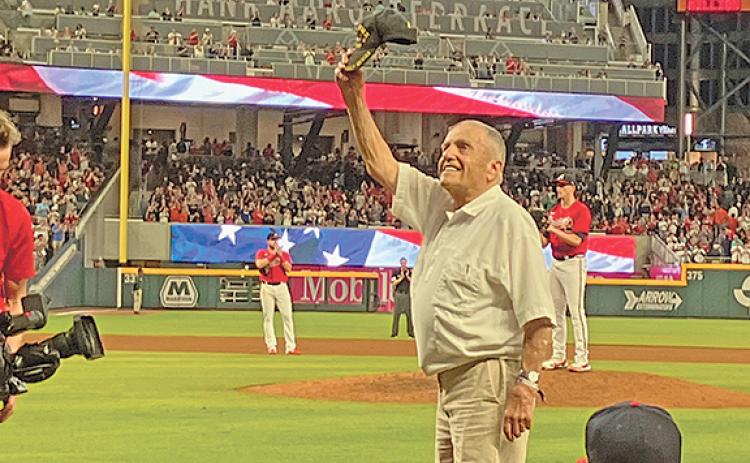 August: Skylake resident Andy Negra waves from the field between the 4th and 5th innings of the Braves game against Houston Astros in Atlanta Friday night. (Photo/submitted)