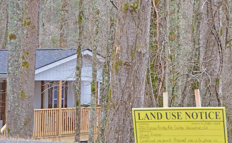 Many in the community have begun to dread seeing the yellow signs pop up that indicate someone is requesting a conditional-use permit for short term rental. (Photo/Linda Erbele)