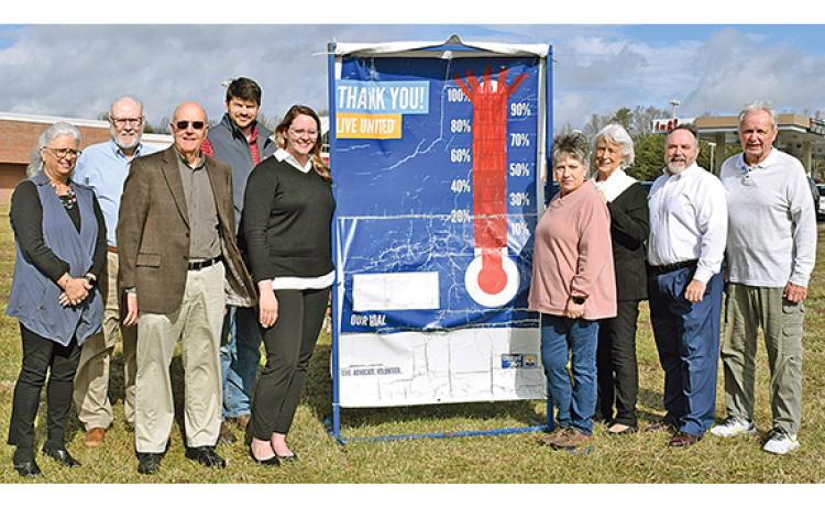 United Way of White County board members celebrating topping of the $80,000 fundraising campaign goal are, from left, Angie Jarrard, Mark Griffin, Dean Dyer, Nathan Eason, Taylor Burrell, Denise Loggins, Mary Isbell, Donald Harris and Gene White. (Photo/submitted)