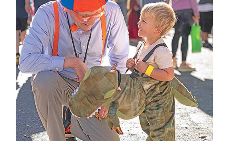 Fun began last weekend at events like Cleveland First Baptist Church’s Fall Festival where Senior Pastor Dr. Phil Weaver shares a laugh with Braxton Frederick. (Photo/ Diane Fenlason)