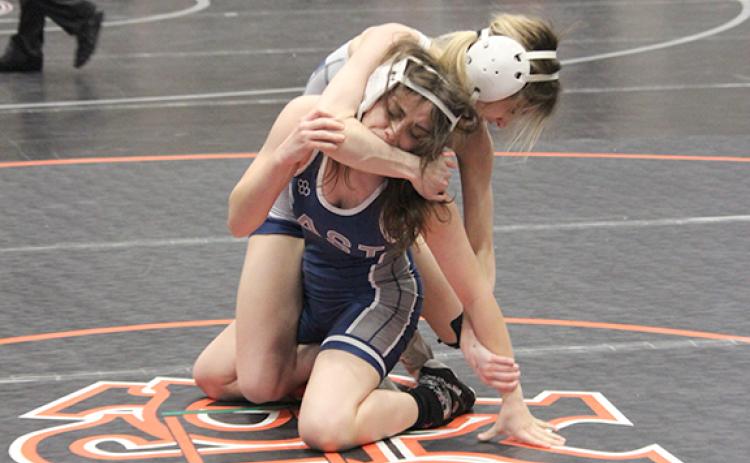 WCHS junior Ollie Weiland takes down East Jackson's Seanna McCarthy during a match in the 110-pound division at the Chestatee event. (Photo/Mark Turner)