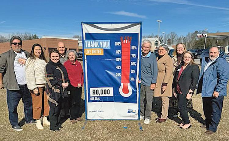Officers and members of the volunteer board of the United Way of White County show celebrate the 2023 fundraising success. Pictured are Chuck Johnstone, Lauren Williams, Kielea Loggins, Dean Dyer, Nanette Baughman, Gene White, Susan Cremering, Carol Powell, Courtney Allison and Donald Harris.