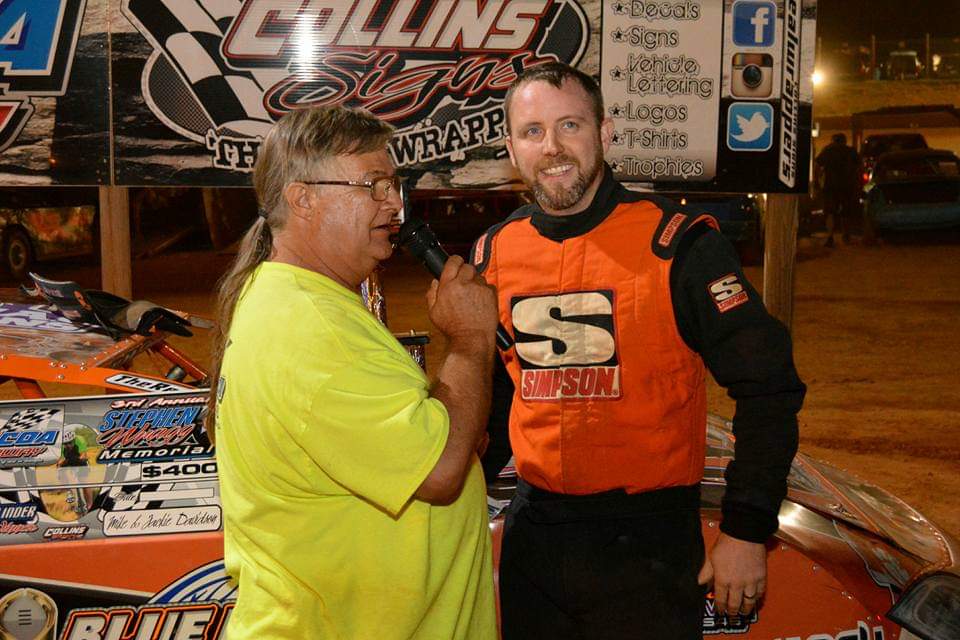 Jule Coffee interviews winning driver Harley Holden at the Toccoa Raceway after a race.  Coffee has been interviewing drivers in Toccoa Raceway's victory lane for about 15 years. (Submitted photo)