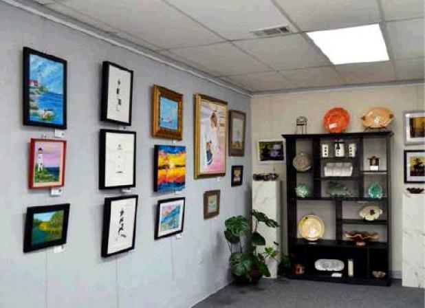 The John Kollock exhibit at the Helen Arts & Heritage Center features different sketches and paintings by the late artist of Helen.