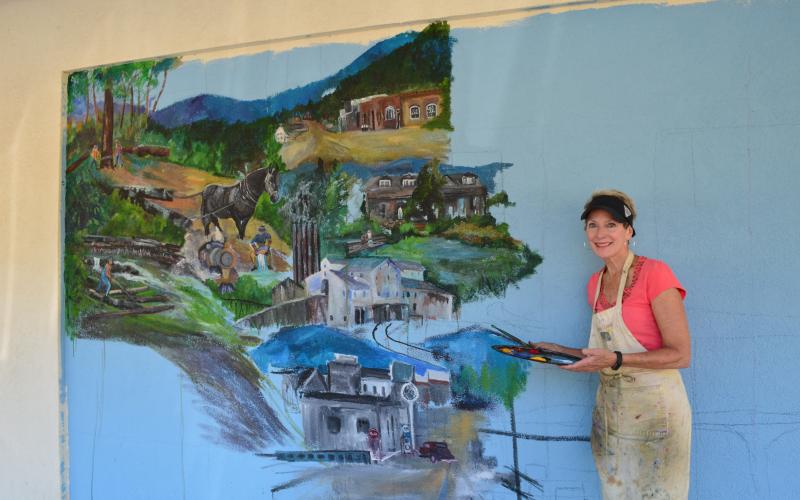 When completed, the new mural by Anna Wilkins will show 100 years of Helen's history. (Photo/Stephanie Hill)