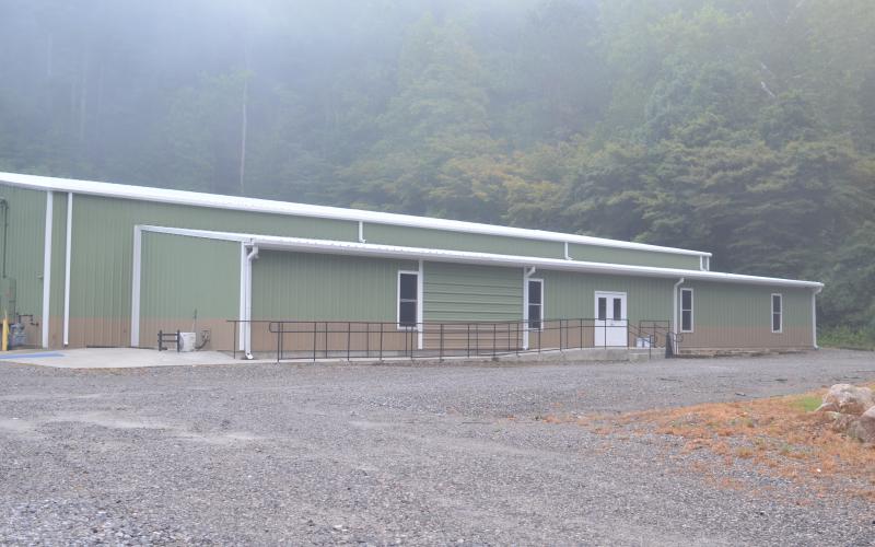 The roughly 12,000-square-foot building, formerly with a red façade, has been repainted with the green, brown and white color scheme of Mountain Education Charter High School. More interior renovation is planned.