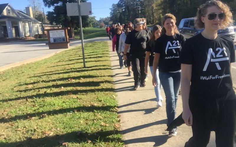 Participants in a previous Walk for Freedom head along Helen Highway toward Cleveland. (Submitted photo)
