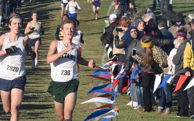 Eamonn O'Bryant, left, and Blessed Trinity's Adam Wade sprint toward the finish line during the state chmpionship race in Carrollton. (Photo/Mark Turner)
