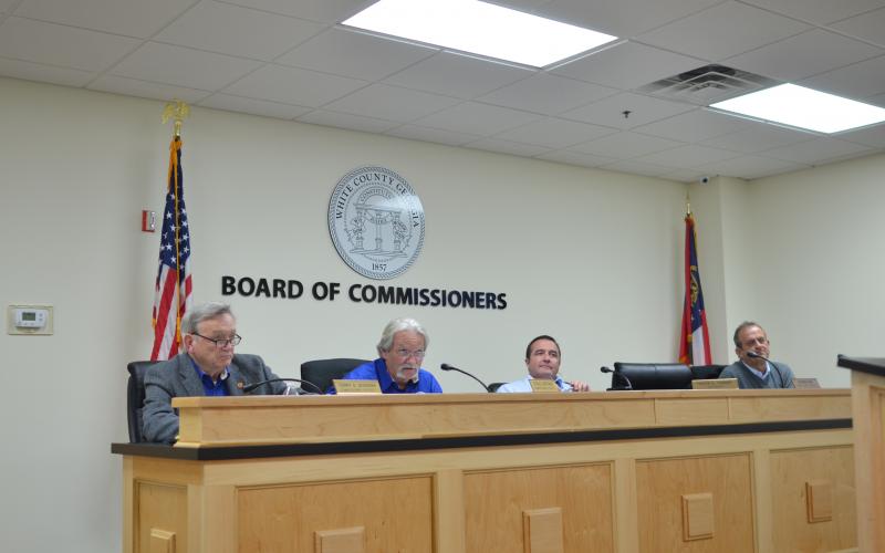 County Commissioners – from left, Terry Goodger, Craig Bryant, Travis Turner and Lyn Holcomb – discuss the outline for establishing a Board of Elections and Registration. Commissioner Edwin Nix was absent. (Photo/Wayne Hardy)