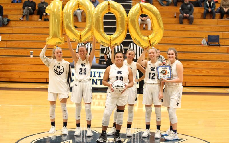 White County High school junior Dasha Cannon, No. 10, recently passed the 1,000-point plateau for her high school career. Cannon was recognized for the achievement followng the Lady Warriors' win over Denmark last Friday night in Cleveland. Shown with Cannon are, from left, Naomi Crumley, Rachel Lovell, Ellie Gearing, Bentley Cronic, and Maddie Futch. (Photo/Staci Sulhoff)