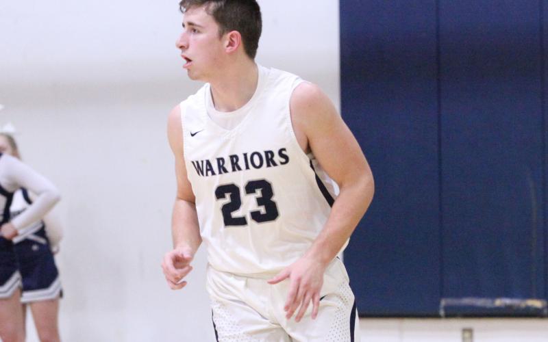 Cooper Turner scored 16 points in the Warriors' region win over West Hall last Friday night in Cleveland. (Photo/Staci Sulhoff)