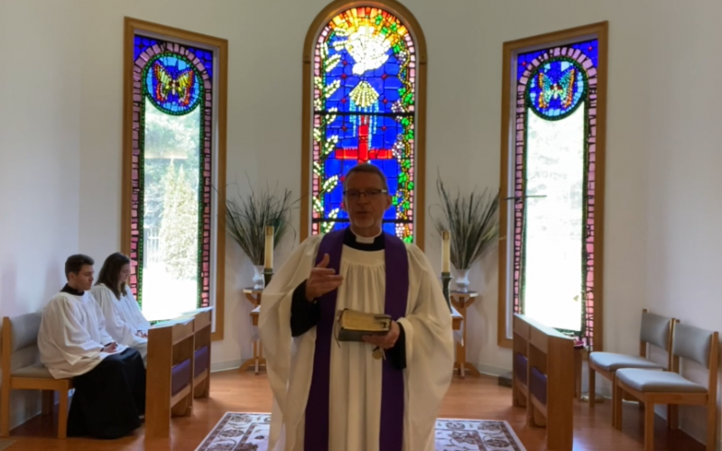 Father Scott Kidd of the Episcopal Church of the Resurrection is using technology (such as recorded video) for worship services.