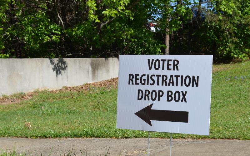  A sign in front of the office tells voters where the box is located. (Photo/Stephanie Hill)