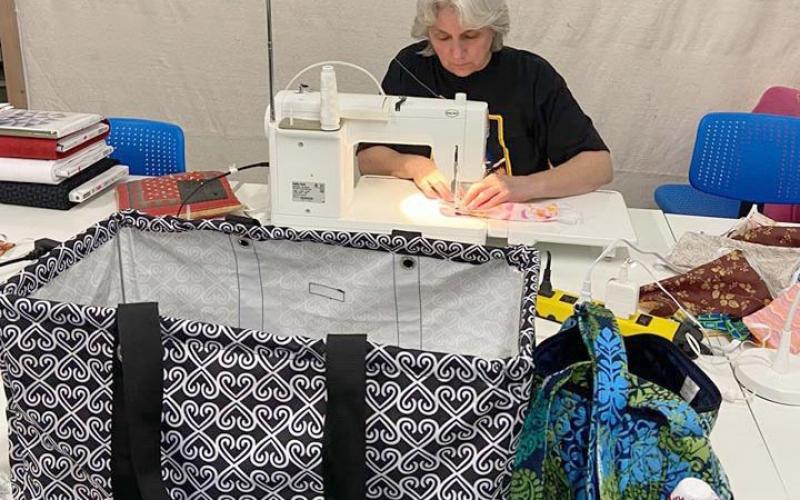 Jan Carlson works on mask kits at Quilt’n Kaboodle in Cleveland. (Photo courtesy Robbie Welch)