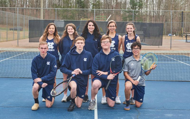 Senior members of the tennis team are, front from left, Dylan Hendrix, Adam Durfee, Brandon Gonzalez, and Hector Malana; back row, Sydney Palmer, Anna Tatum, Sarah Berry, Maria McCue, and Catherine Westbrooks. Not shown is Rylee England. (Photo/Staci Sulhoff)