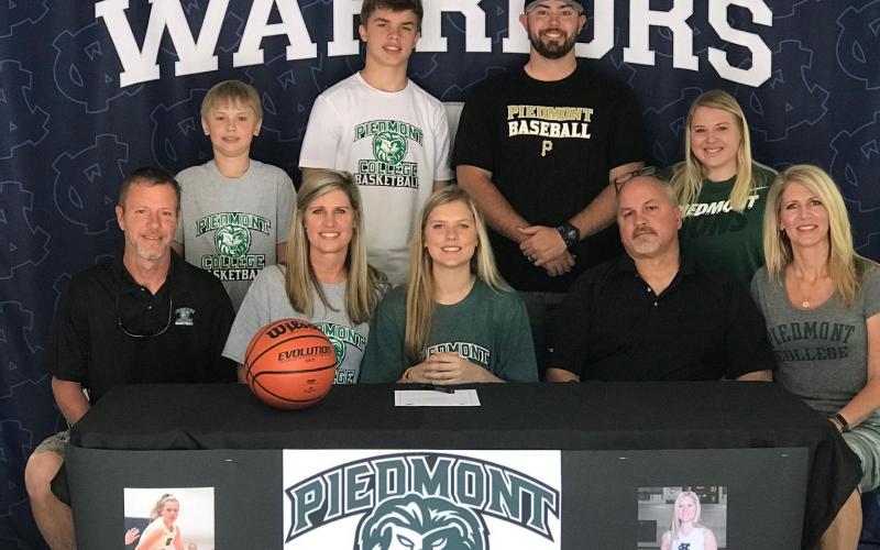 White County High School senior Bentley Cronic will continue her academic and athletic career at Piedmont College in the fall. Cronic signed a letter of intent this week to become part of the Lady Lions' basketball program. Piedmont College is a NCAA D-III college in Demorest. The Lady Lions finished 19-9 this past season, and have won three of the last four USA South tournament titles. Shown during the signing ceremony are, from from left, Galen Robinson, Amanda Robinson, Bentley Cronic, Thad Cronic, and C