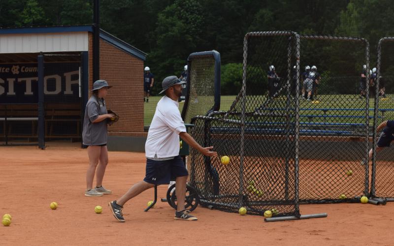 WCHS softball coach Drew Owens, shown last year during a summer workout, will be allowed to work out his players when the conditioning program begins in two weeks. (Photos/Mark Turner)