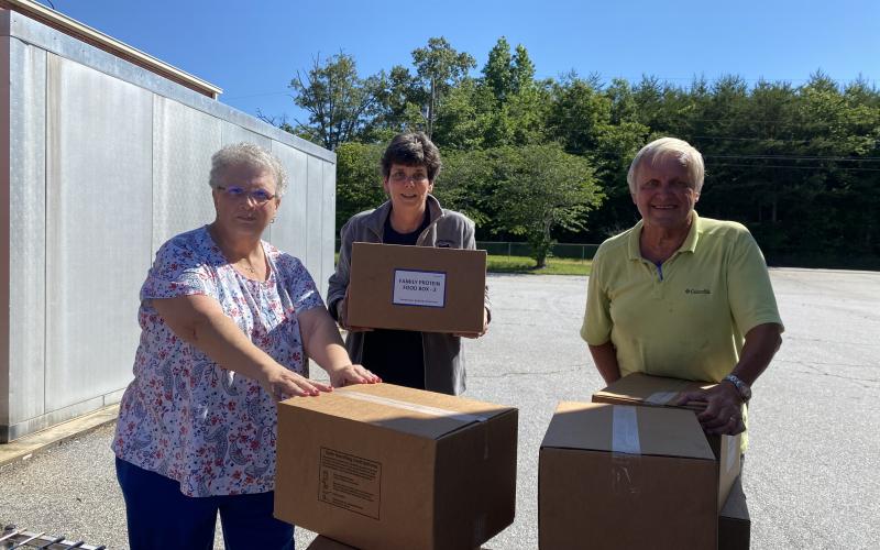 The Community Helping Hands Clinic got help from the White County School Nutrition Department, Mt. Yonah Baptist Church, White County Food Pantry and White County Rotary Club to help unload, store and ultimately distribute a donation of 225 food boxes from Americans Helping Americans. (Submitted photos)