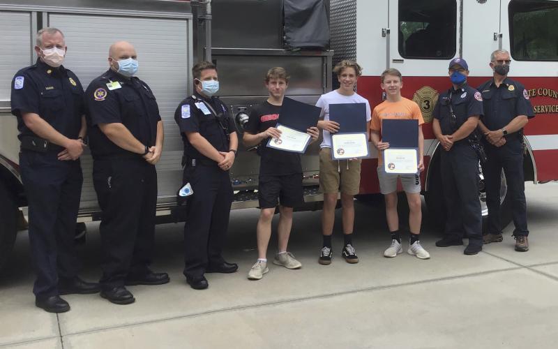 Fire services photo: Pictured, from left, are Fire Chief Seth Weaver, Paramedic Josh Eaten, EMT  Matt Hill, Jack Bandy, Daniel Green, Ben Bandy, Captain Josh Taylor, and Battalion Chief John Lumsden. (Submitted photo)