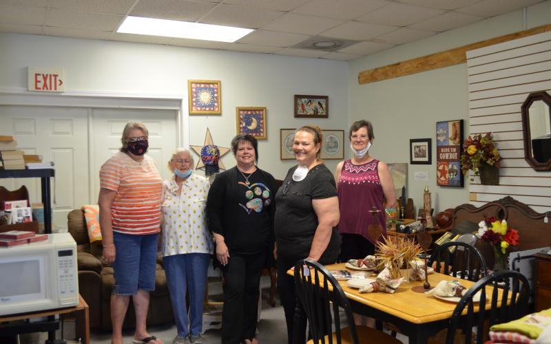 Pictured from left, are volunteers Kathy Godfrey, Virginia Edwards, Debbie Spitzer (store manager), Karen Degges and Susan Alexander at Rescue Re-Tail, a new thrift store benefitting the Charles Smithgall Humane Society. (Photo/Stephanie Hill)
