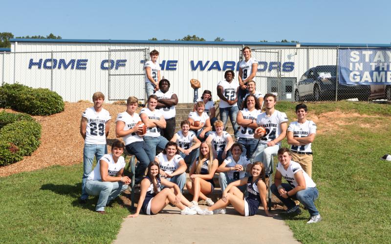 Senior members of the WCHS football and cheer teams are, from row from left, Clayton Rogers, Elizabeth Woodson, Ashley Howe, and Cooper Turner; second row, Devin Sullens, Lindi Hoersten, and Andrew Pierce; third row, Rylee Higgins, Riley Stancil, Seth Stonecypher, Jimmy King, Jackson Autry, Dylan Archer, Jesse Moose, and Roy Bennett; fourth row, Heaven Gholston, Tyler Davis, and Reece Dockery; top row, Dylan Weaver, Harmon Grier, Jaquez Williams, and J. Ben Haynes.  (Photo/Staci Sulhoff)