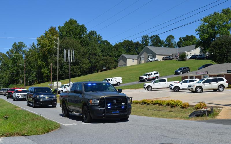 Local public safety vehicles joined the funeral procession Sept. 21 for White County Animal Control division chief Joey Kastner. (Photo/Stephanie Hill)