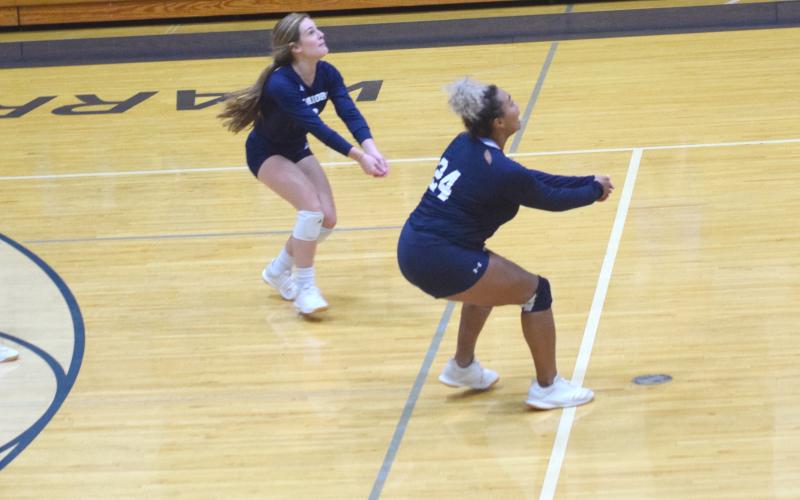 The White County volleyball team stayed atop the Area 7-AAA leaderboard with a pair of road wins Tuesday night in Oakwood.