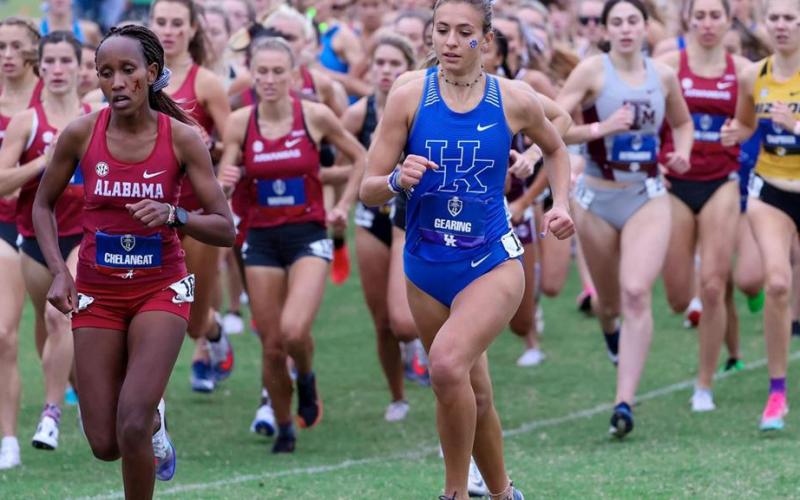 University of Kentucky's Jenna Gearing, right, and Alabama's Mercy Chelangat sprint to the front of the field during the start of the SEC Women's Cross Country Championship meet last Saturday in Baton Rouge, La. (Photo/ukathletics.com)