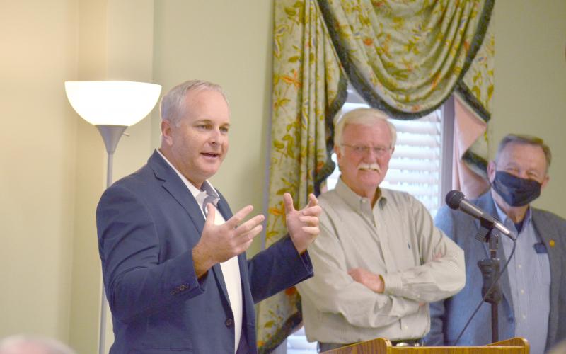 Sheriff-elect Rick Kelley (left) talks about the lasting impact Neal Walden will have on the county, as the retiring sheriff looks on during a Dec. 3 celebration. (Photos/Wayne Hardy)