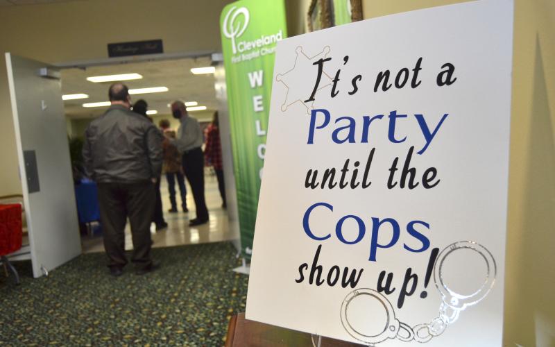 A humorous sign greeted guests – including law enforcement – at the event.