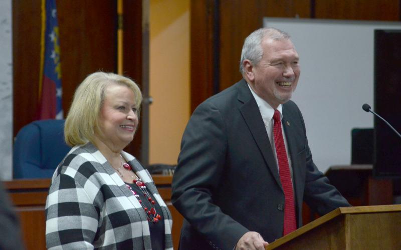 Probate Judge Garrison Baker speaks to the crowd, accompanied by his wife, Susan Baker. (Photos/Wayne Hardy)