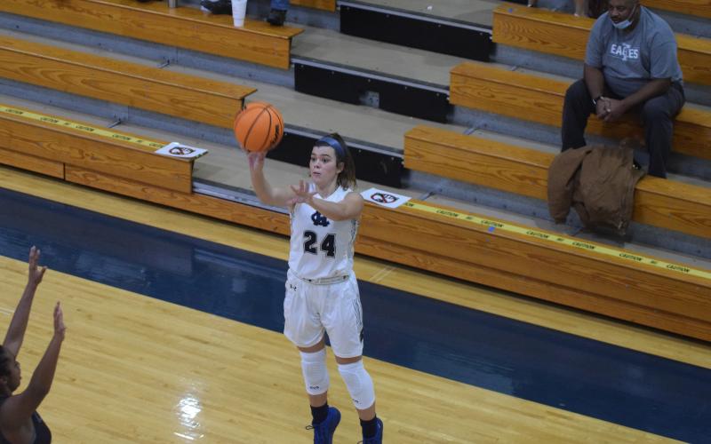 Makenna Moose and the Lady Warriors take on North Hall Saturday afternoon in a 7-AAA game in Cleveland. (Photo/Mark Turner)