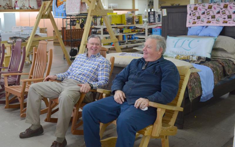  Charlie Thomas and Larry Kinsey chatted one morning while in the rocking chairs at the store.