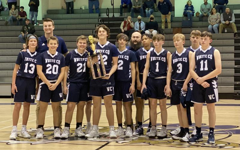 The WCMS eighth-grade boy's basketball team shows off the runner-up trophy following the championship game last Friday at Clear Creek Middle School in Gilmer County. (Photo/Shelton Sweets)