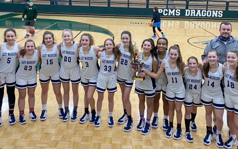 The Lady Warriors' eighth-grade team capped off a perfect season with a win over Pickens County in the Mountain Athletic Conference title game last week in Jasper. (Photo/WCMS Athletics)