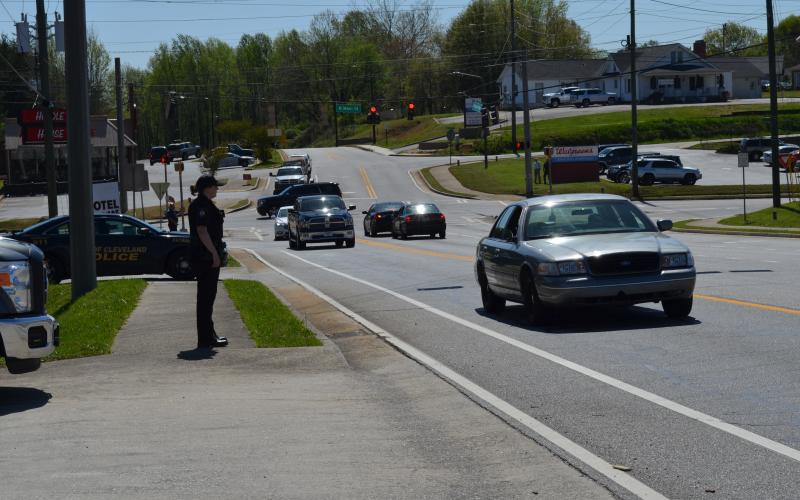 Officer Sarah Emery observes motorists at the intersection of U.S. 129 S. and Helen Highway. 