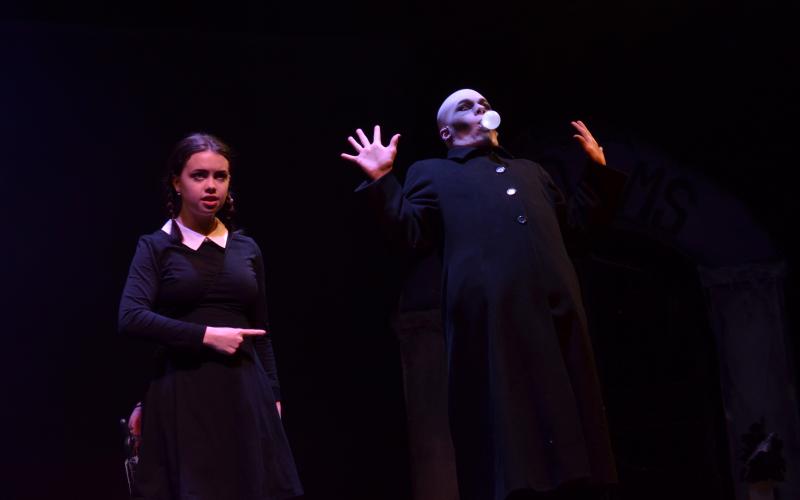 Molly Cutchshaw as Wednesday Addams, and Colin Baughman as Fester, got into character during dress rehearsals on Monday, April 19.