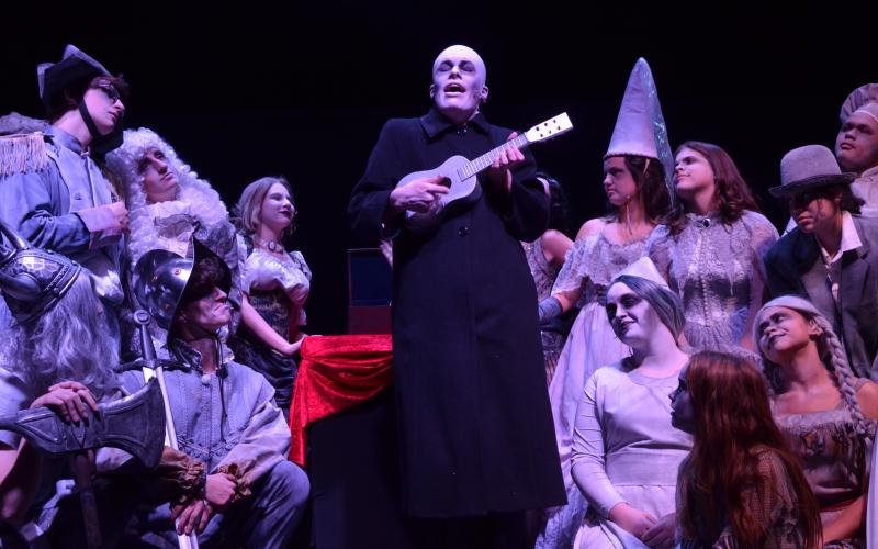 Colin Baughman, as Fester, sings a song with the ancestors during the show.