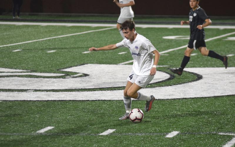 Thad Gensler had a pair of goals in the 6-3 non-region loss Tuesday to West Forsyth. (Photo/Mark Turner)