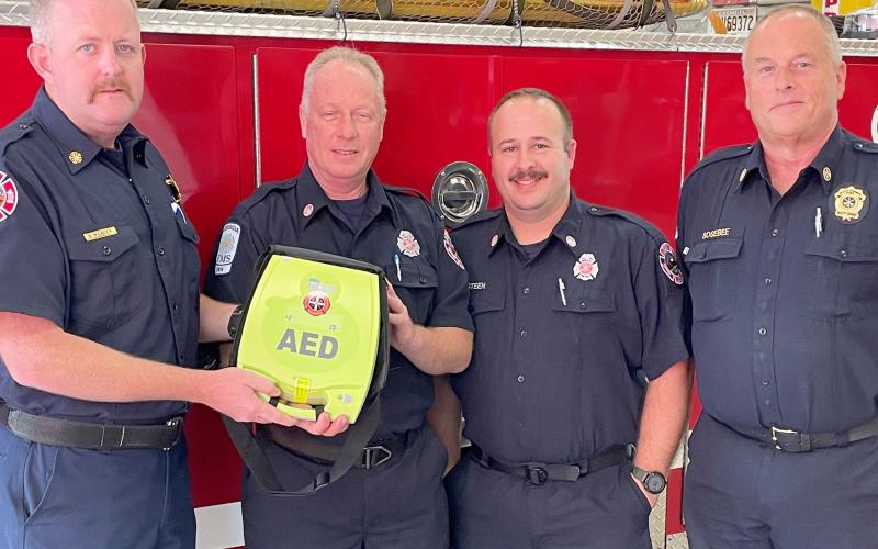 White County firefighters with the AED. 