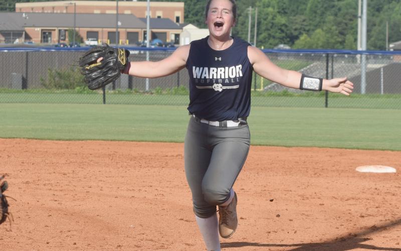 Gabby Whiddon celebrates during the Lady Warriors' summer league win Tuesday over Union County. (Photo/Mark Turner)