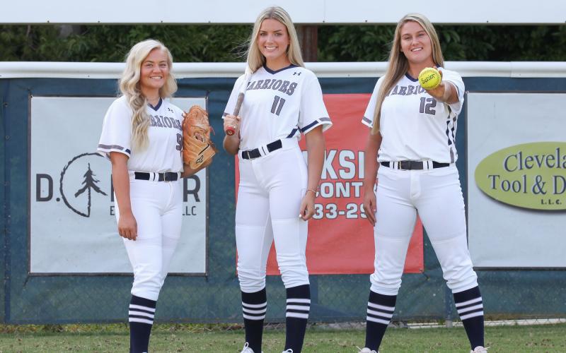 WCHS seniors, from left, Annika Vandiver, Reagan Dunagan, and Liana O'Kelly have some fun during a photo session. The senior trio will lead the softball squad this fall as they chase a Region 7-AAA title and a spot in the Class AAA state playoffs. (Photo/Staci Sulhoff)