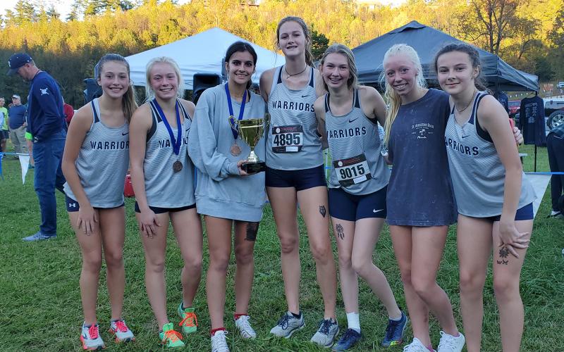 The Lady Warriors are headed back to the state meet after finishing second in the Region 7-AAA meet last week at Unicoi State Park. The runners will compete in the Class AAA race Friday at 11:15 a.m. in Carrollton. Members of the team are, front left, Emma Lightsey, Nealeigh Broadwell, Lily Gearing, Brianna Bilhovde, Lydia Davidson, Reese Vandegriff, and Emma Marrow. (Photo/Mark Turner)
