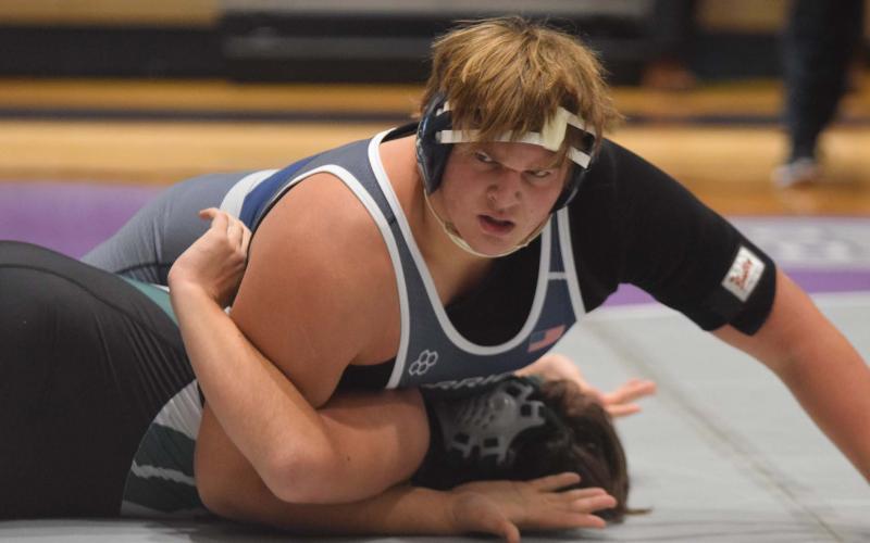 JD Trowell dominated a pair of 285-pound divison matches during the 7-AAA Area Duals. Trowell posted a pair of first period pins itn the Warriors' win on the way to the program's first area duals championship. 