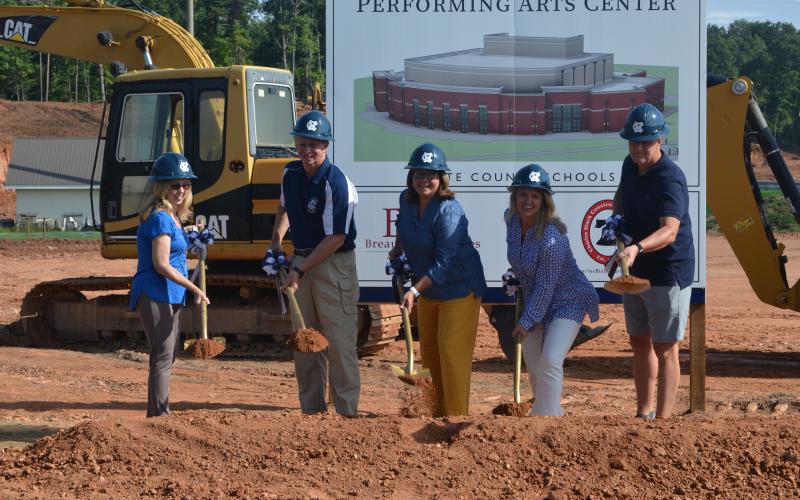 School board members broke ground Tuesday on a new 41,000 square-ft. performing arts center on the campus of White County High School. From left are Linda Erbele, vice-chairman Charlie Thomas, Superintendent Dr. Laurie Burkett, chairman Missy Jarrard and Jon Estes.