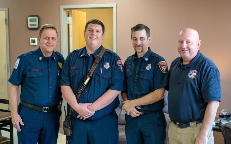 Two White County firefighters were recently recognized for their life-saving efforts.