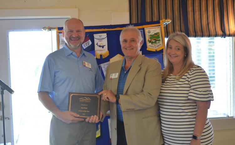 Ron Webb of Sautee Nacoochee (center) receives the 2019 Citizen of the Year Award from White County Chamber of Commerce President Beth Truelove (right) and Chamber executive board member Todd Marks, during the Sept. 3 meeting of the Rotary Club of White County. (Photo/Wayne Hardy)